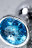 Серебристая конусовидная анальная пробка с голубым кристаллом - 7 см.  